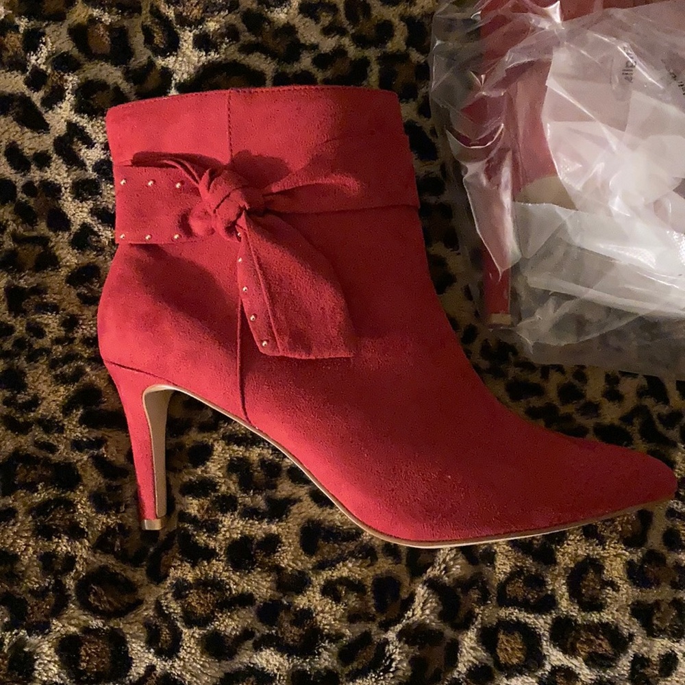 Torrid Red heeled booties with Bow